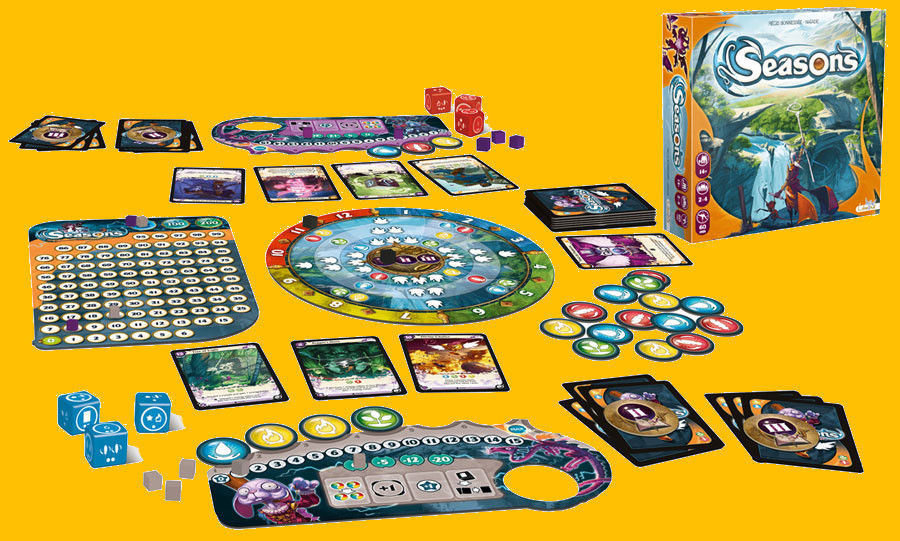 Photo prsentant le matriel utilis dans le jeu Seasons - Sets de ds particuliers, cartes, plateaux de jeu et boite du jeu en en  droite.